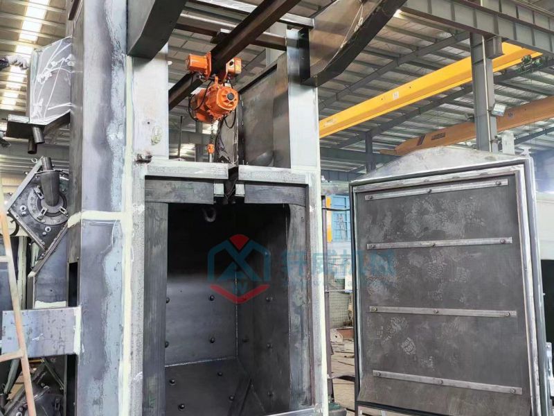 Production shot of integrated hook shot blasting machine