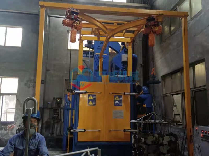 Q376 Double Hook Shot Blasting Machine