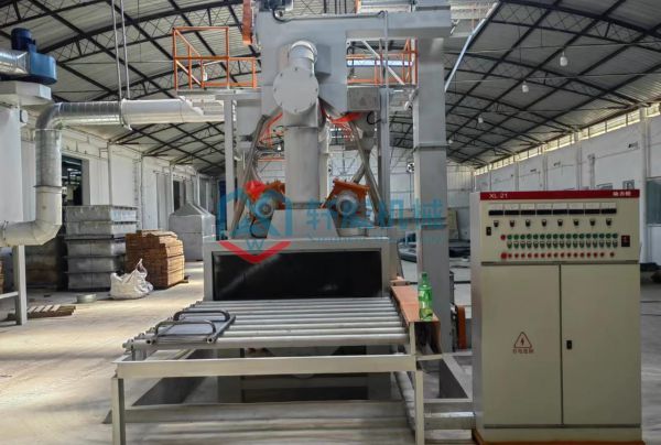 Structural component through shot blasting machine