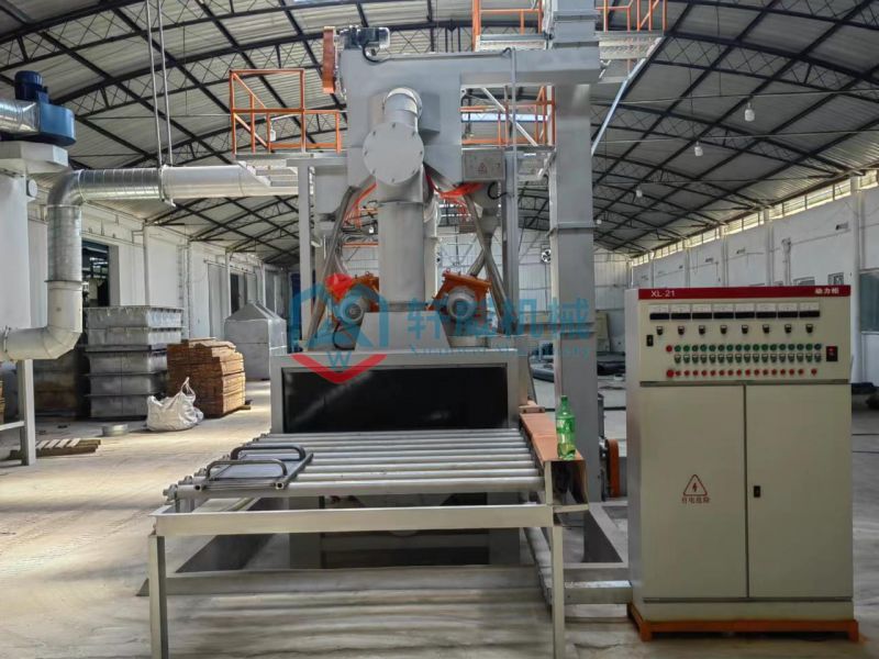Structural component through shot blasting machine