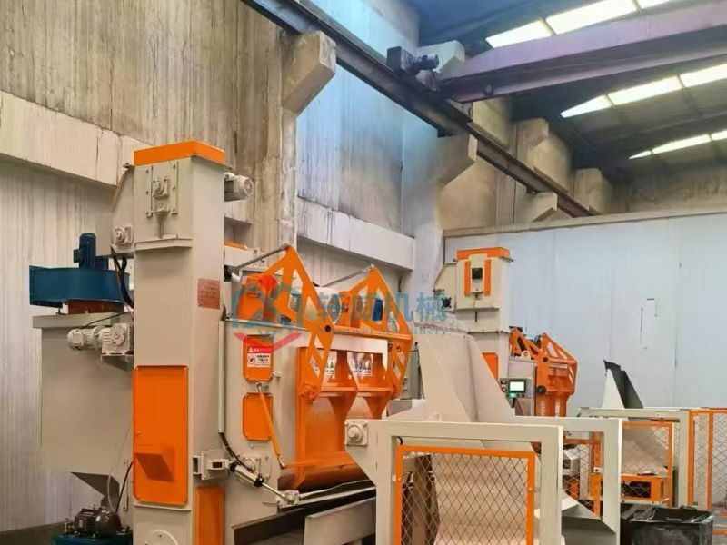 Automatic loading and unloading track type shot blasting machine